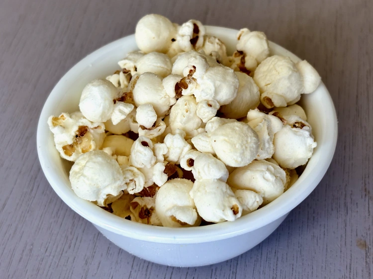 A small bowl of Simply Smartfood popcorn